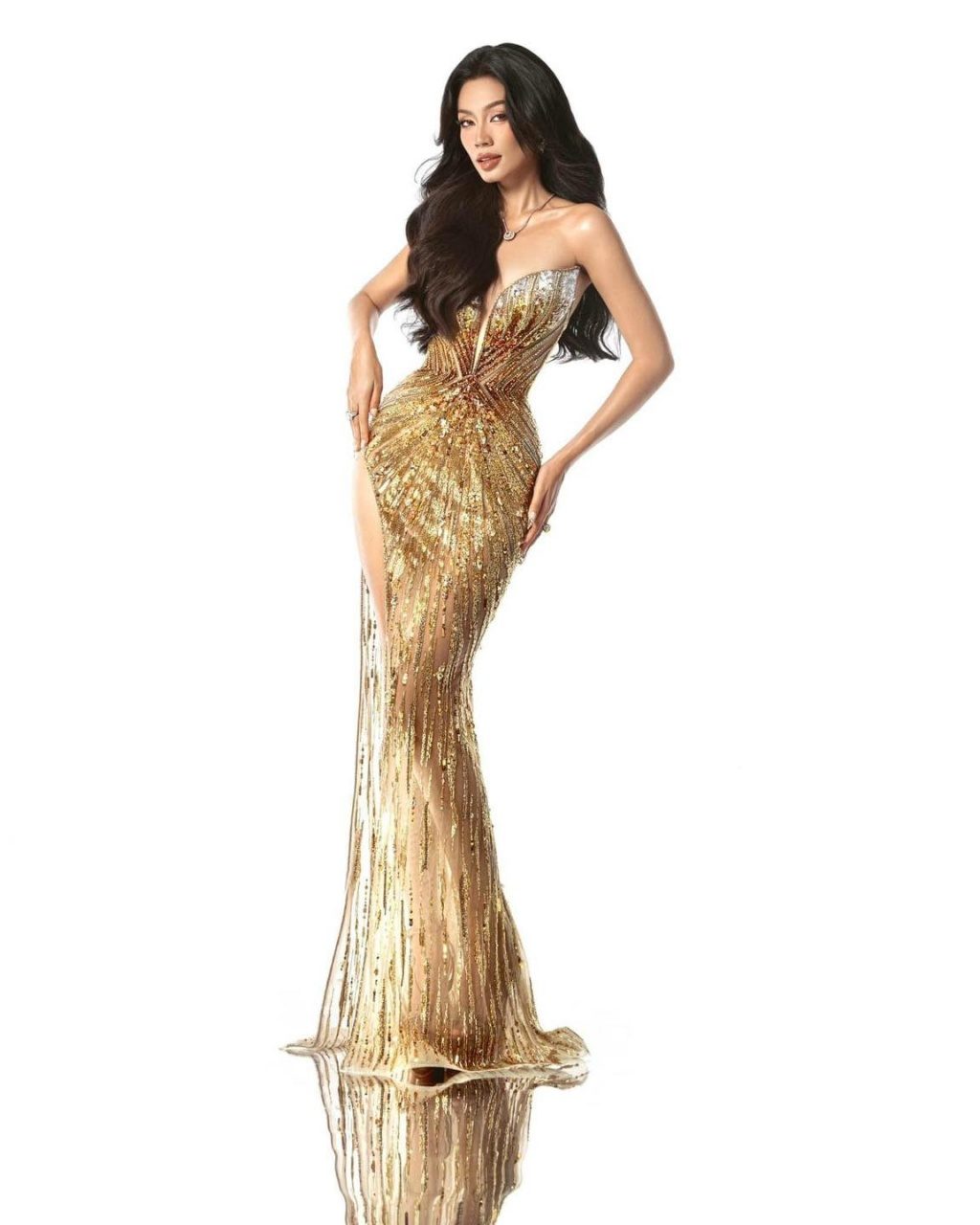 Paris Bảo Nhi trong đầm dạ hội ánh kim - Miss Universe Vietnam 2024